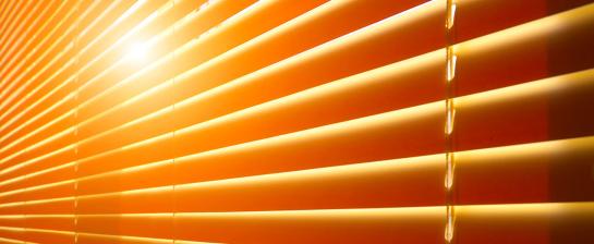 Hot sun through blinds. Image credit iStock/SVproduction