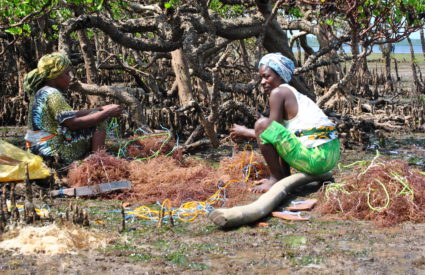 Women preparing fishing net photo credit Francis Okalo