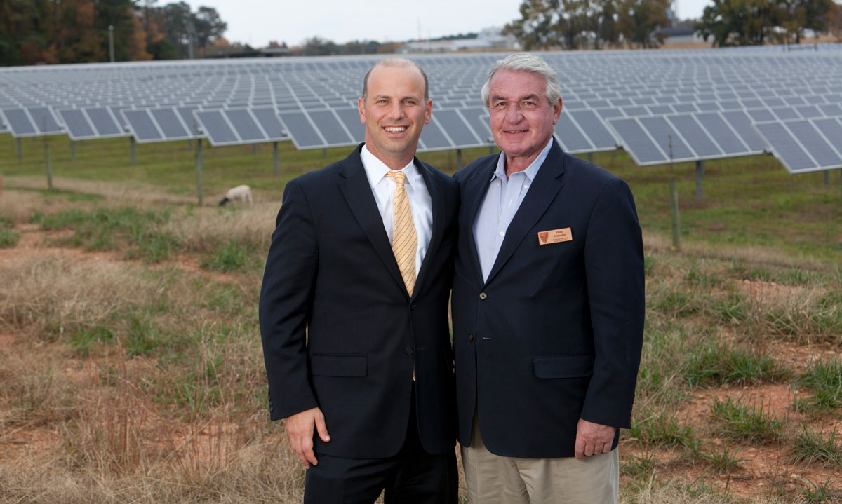 Pete Nicholas and Tim Profeta at a solar panel installation
