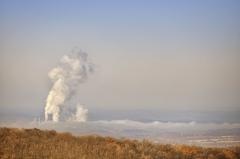 Coal burning plumes over a rural landscape in Pennsylvania