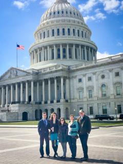 project team in front of capitol