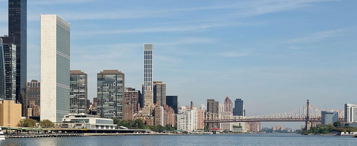 Shore of the East River with Headquarters of the United Nations (on the left), New York City