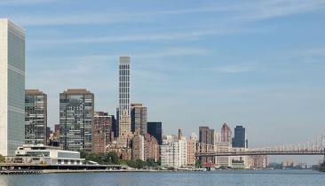 Shore of the East River with Headquarters of the United Nations (on the left), New York City