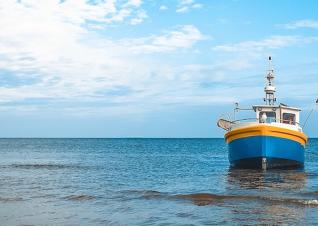 Fishing boat by the seashore